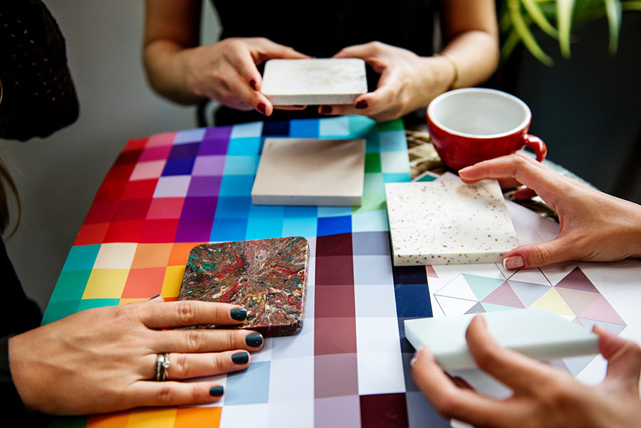 Interior designer showing tile samples 