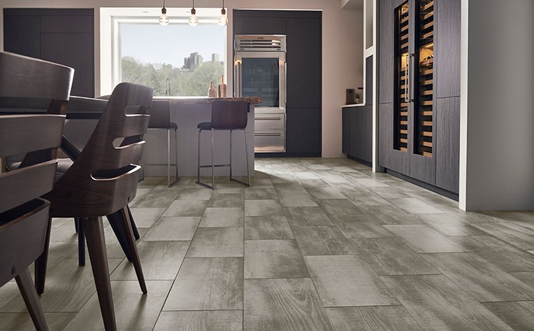 modern kitchen with dark tile floors